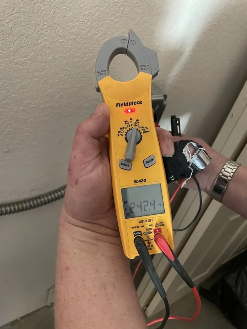 Voltage testing with clamp meter during Aluminum Wiring Replacement in New Boston